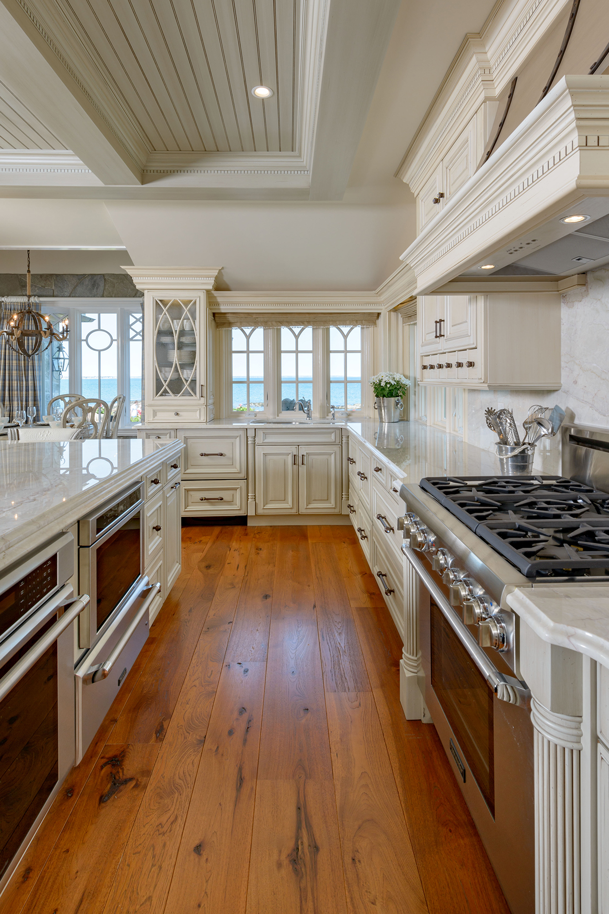 Carlisle random width hickory flooring adds warmth to this kitchen.