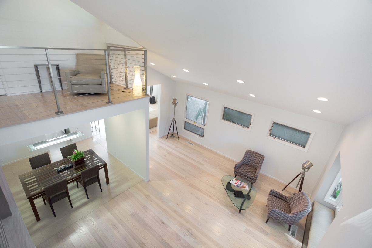 Wooden floor with light-colored planks and natural grain texture